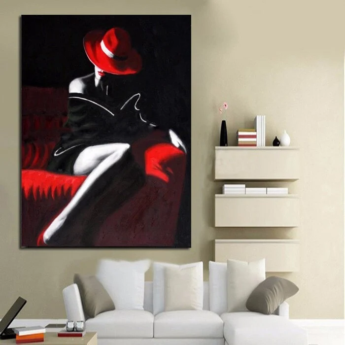 Toile la fille sexy en rouge avec les jambes croisées Petite